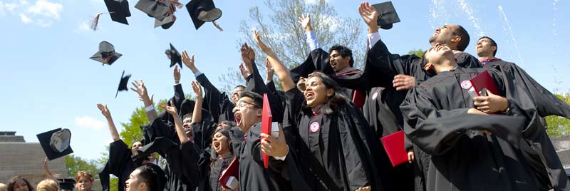 Students toss their caps at commencement